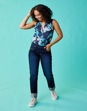 Woman wearing Carson Jeans on Blue Background