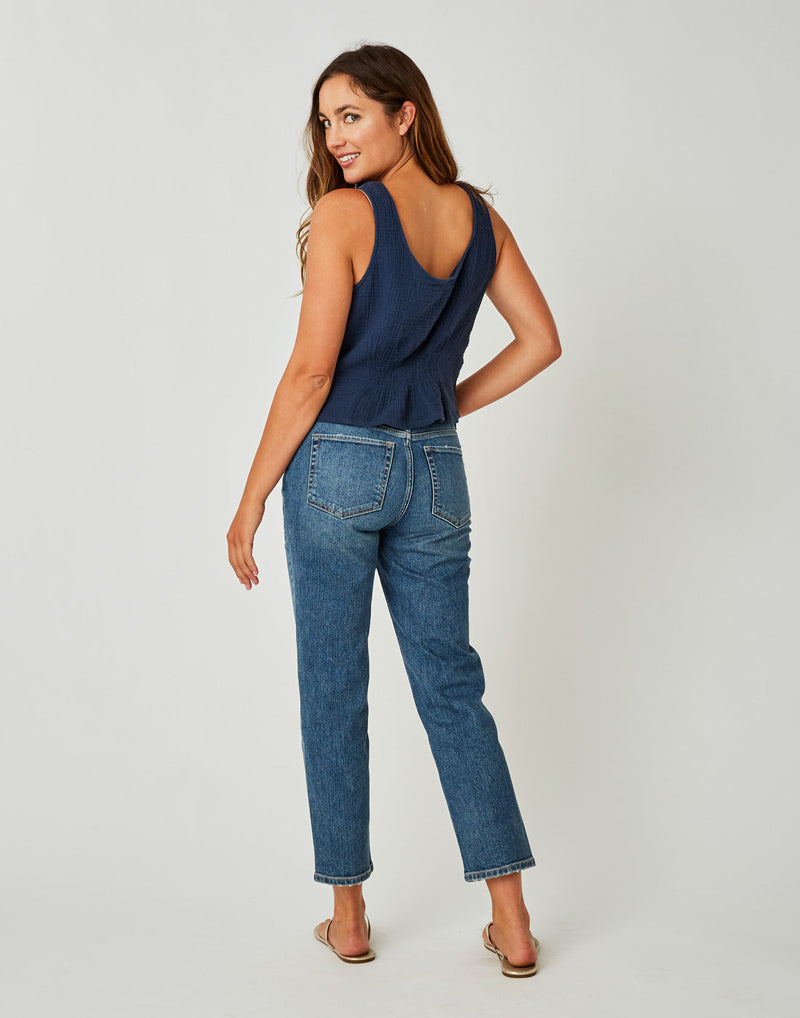 Back View of Woman wearing a blue tank top and the blue Brady Straight Leg, Crave Designs
